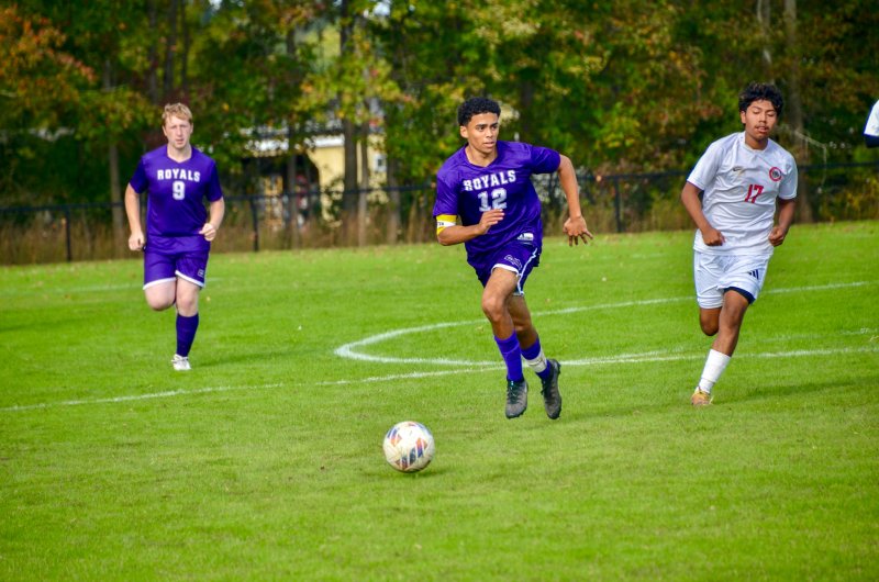 Royals sophomore Cam Smithson crosses midfield.