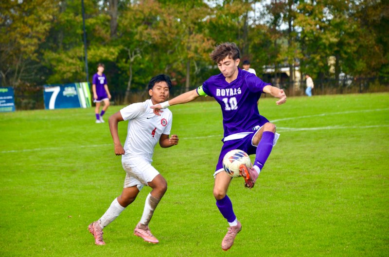 Royals junior Jay Parrish settles a bouncer.