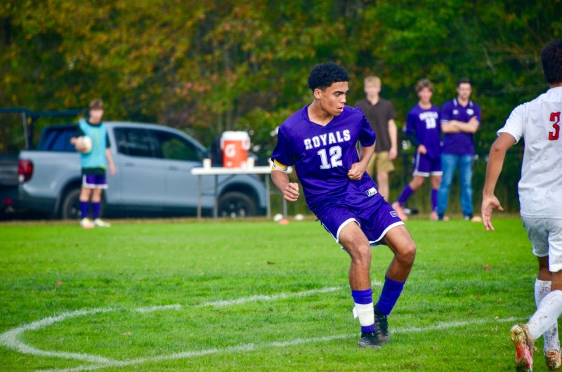 Delmarva Christian sophomore Cam Smithson watches his first goal of the year roll in.