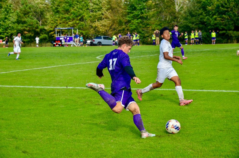Royals sophomore Ian Campbell begins to give the ball a ride into the box.
