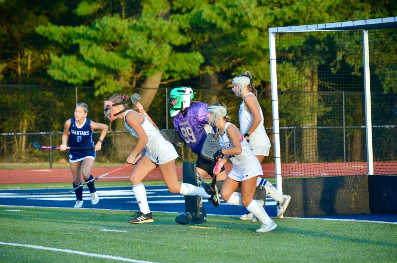 Seahawks junior Meredith Schiff and sophomore Logan Stiles lead the way as goalie Kacie Rawlings gets set and Maeve Lawson covers near-post.