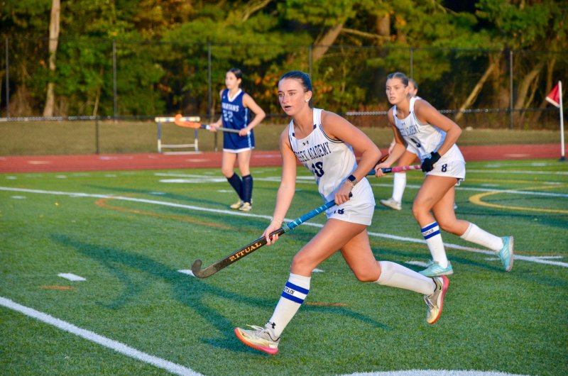 Sussex Academy senior Shea Danahy begins to press.