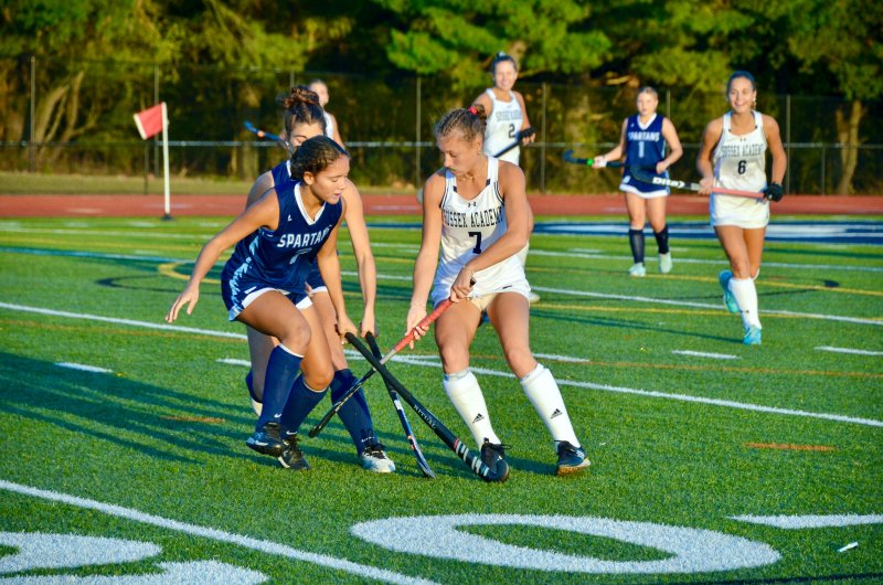 Sussex Academy junior Meredith Schiff tries to get past some Spartans.