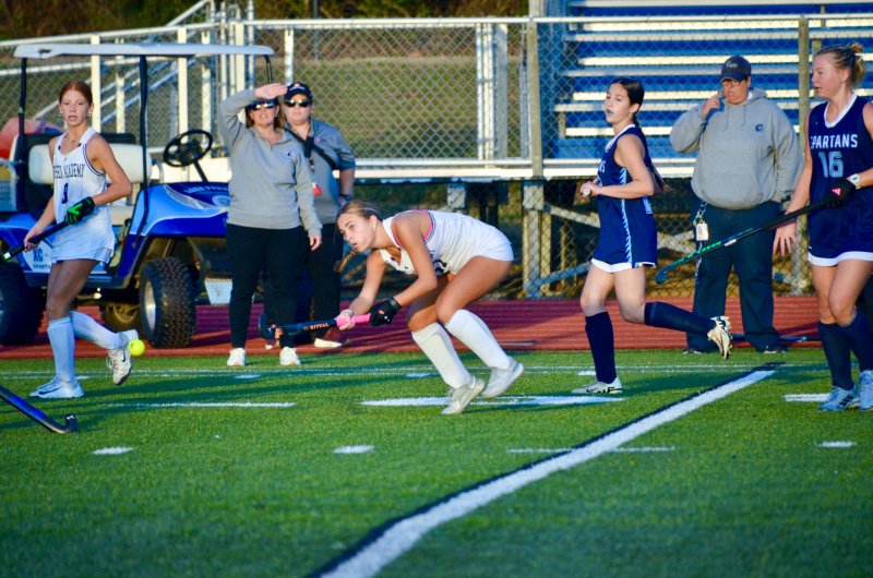 Seahawks sophomore Logan Stiles passes the rock.