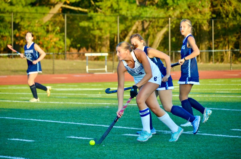 Sussex Academy senior Ryan Lowe races toward midfield.