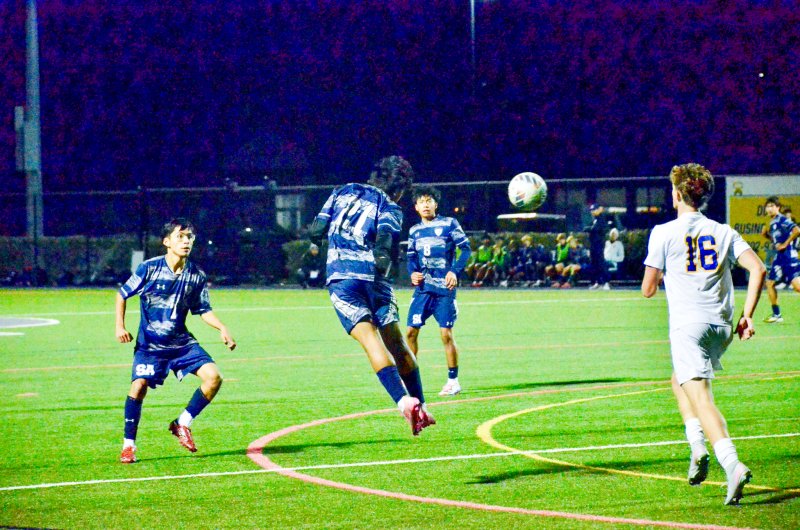 Seahawks junior Brandon Jaimes jumps up for a header.