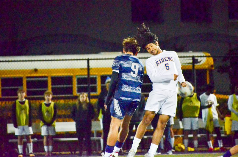 Sussex Academy senior George Sapna meets Daniel Marte head-on.