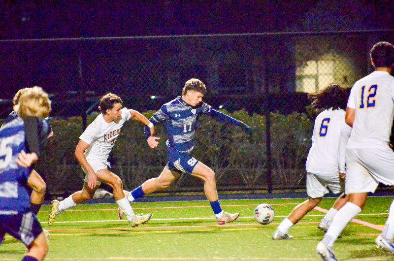 Sussex Academy senior Chase Ballinger flies down the flank.