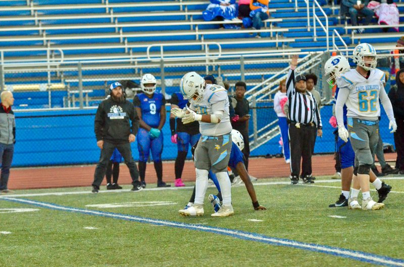 Vikings freshman Javier Morales-Roblero celebrates a sack.