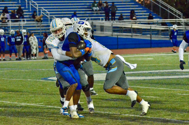 Cape seniors Liam Ramsey, left, and Dell Richards nip the run in the bud.