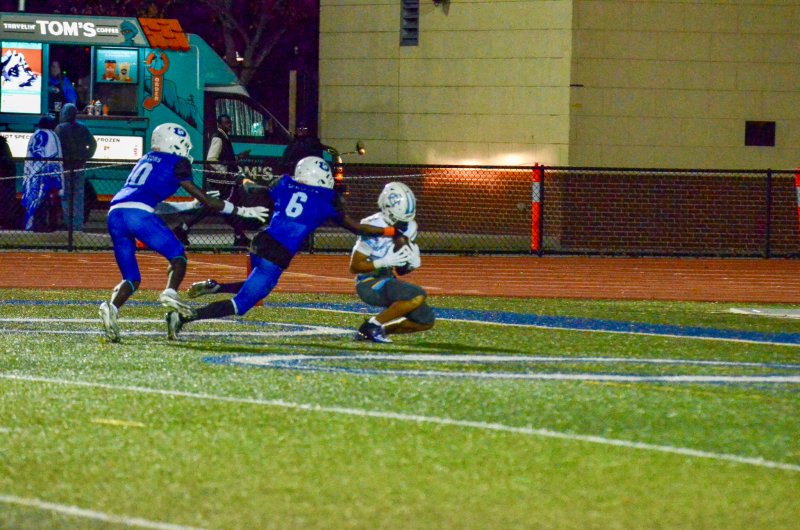 Somehow someway, Lamar McCoy holds on to this bomb from Jameson Tingle, despite his helmet being pulled down.