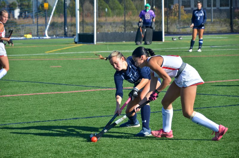 Sussex Academy junior Bailey Mears battles for the ball.