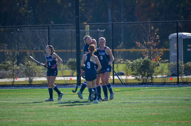 Sussex Academy senior Ryan Lowe jumps on junior Bailey Mears after the latter took the former’s pass and scored to make it a 2-1 game in the second quarter.