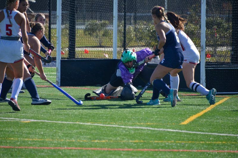 Sussex Academy senior Kacie Rawlings makes one of her 16 saves in the game.