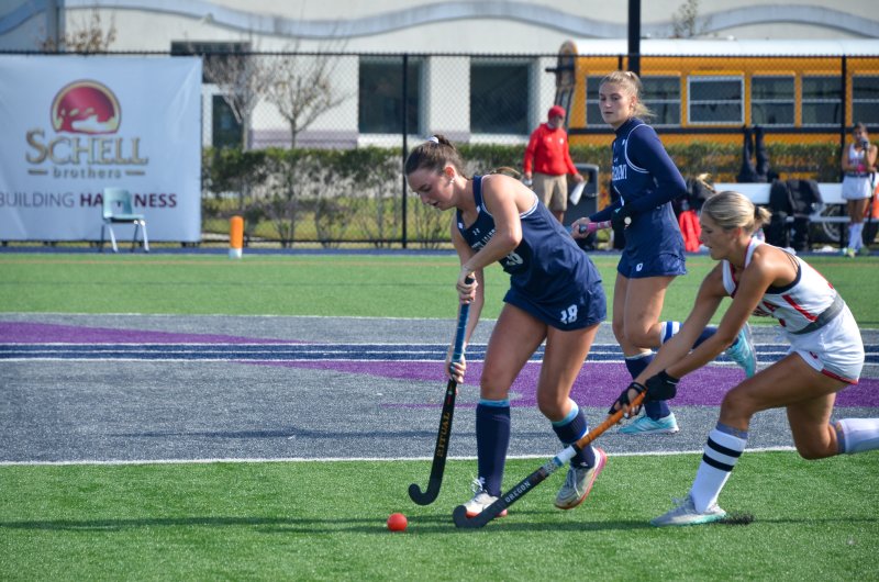 Sussex Academy senior Shea Danahy has to deal with a check from behind.