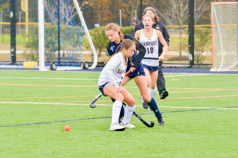 Sussex Academy junior Meredith Schiff uses a nifty move to get past her defender.
