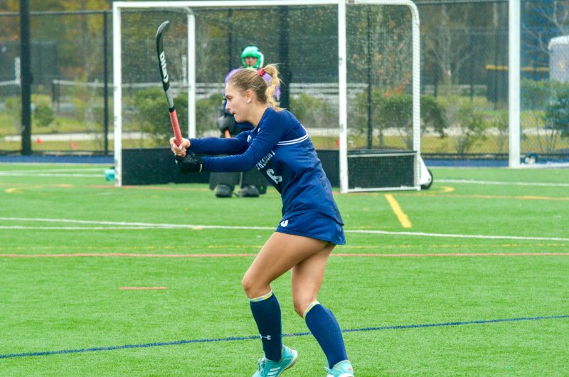 Seahawks junior Liz Layton follows through on a hit.