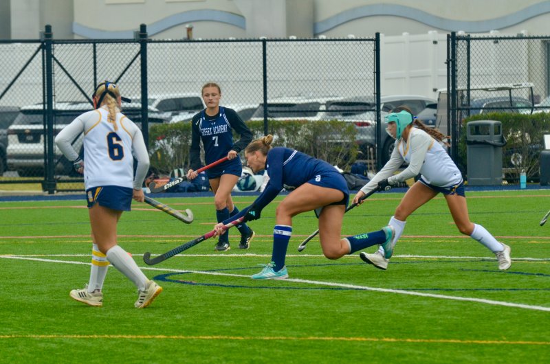 After two goals with her backhand, Sussex Academy senior Ryan Lowe uses a regular shot to complete her hat trick.