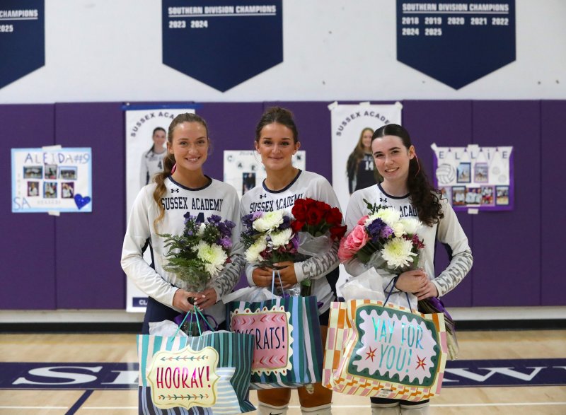 Sussex Academy volleyball celebrated the varsity careers of (l-r) Ellie Merrick, Aleida Calloway and Carolyn Reese before their Henlopen South battle with Lake Forest. ERIC GOOCH PHOTOS