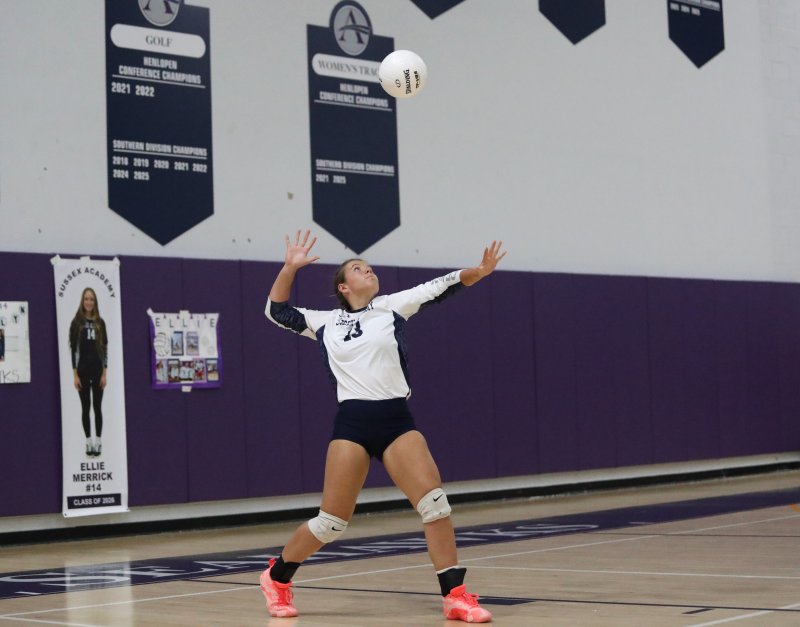 Sussex Academy junior Grayce Glover serves the ball.