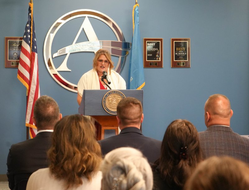 Sara Poore, executive director of the Delaware Anti-Trafficking Action Council, addresses the crowd.