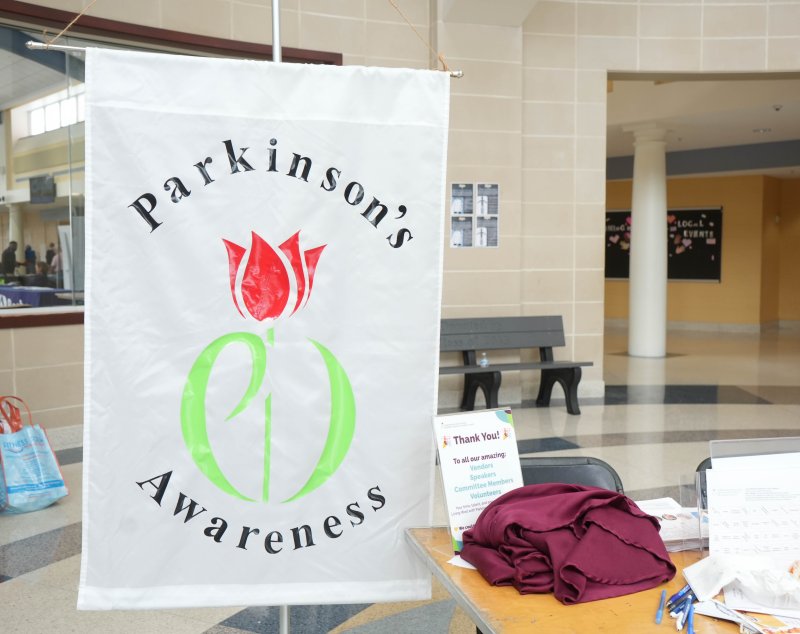 At the entrance to the expo is a banner for Parkinson’s awareness.