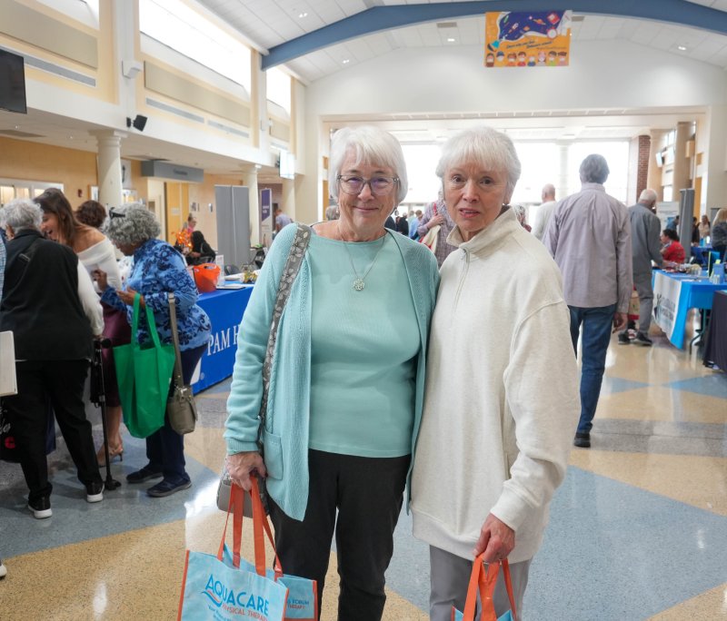 Paula Thetford, left, and Nancy McCloskey enjoy the day together.