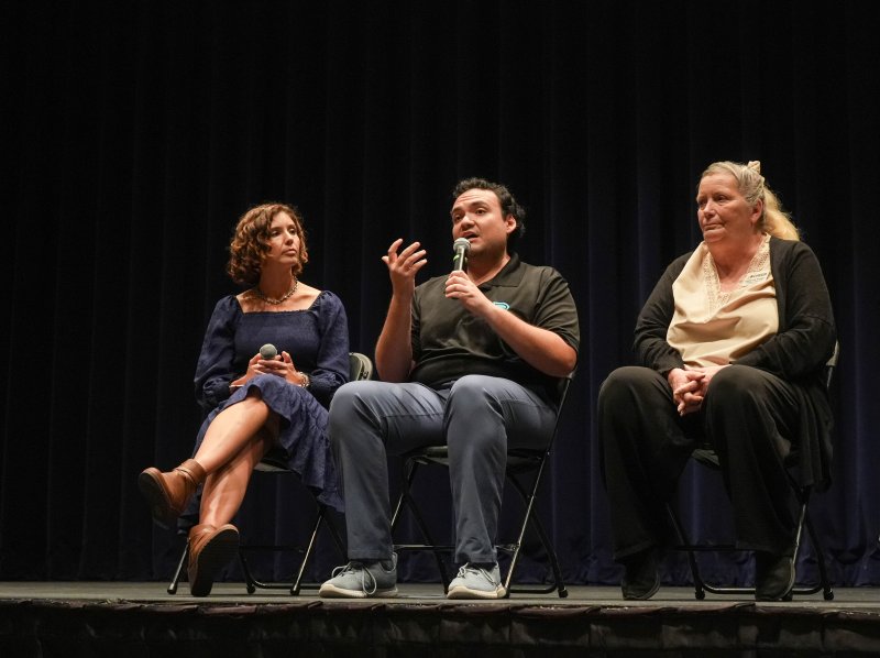 Derek Russell, middle, education and outreach manager at the Parkinson’s Foundation, speaks about genetic marker testing during a panel. Also pictured are PAM Health’s Erin Scharp, left, and Christie Shirey, a caregiver specialist at CHEER and the Community Resource Center.