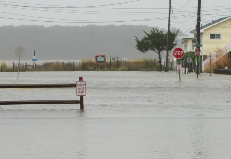 A speed bump in Dewey Beach is completely underwater. ELLEN MCINTYRE PHOTO