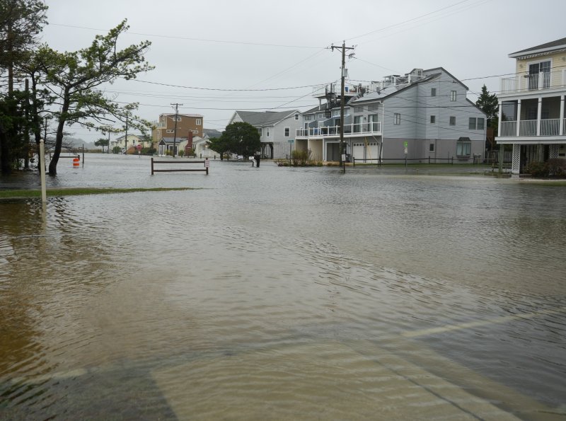 Flooding completely takes over Read Avenue in Dewey Beach. ELLEN MCINTYRE PHOTO