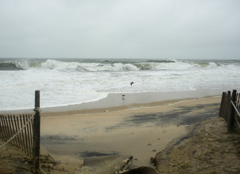 Waves crash into the sand in Dewey Beach. ELLEN MCINTYRE PHOTO