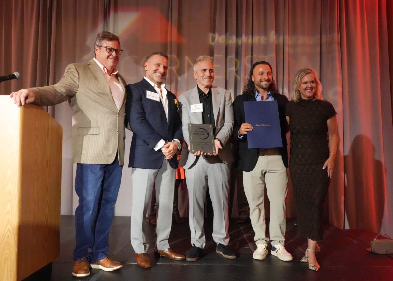 The DRA named the partners of Bardea Restaurant Group the 2025 Restaurateurs of the Year. Shown are (l-r) DRA Chair Jeff Gosnear, Bardea partners Pino DiMeo, Scott Stein and Antimo DiMeo, and DRA President and CEO Carrie Leishman.