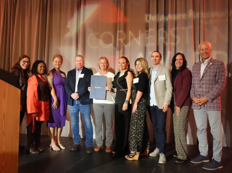 The Delaware Restaurant Association presents its 2025 Cornerstone Award to 1776 Steakhouse during a gala Oct. 20 in Dewey Beach. Shown are (l-r) Rep. Claire Snyder-Hall, D-Rehoboth Beach; Rep. Alonna Berry, D-Milton; Jodie Jones; Tom Holmes, managing partner at 1776 Steakhouse; Tammy Mozingo, executive chef; Tamara Tattersall; Laurie Holmes; Alex Piatrou; Sen. Kyra Hoffner, D-Leipsic; and Rep. Lyndon Yearick, R-Woodside. ELLEN MCINTYRE PHOTOS