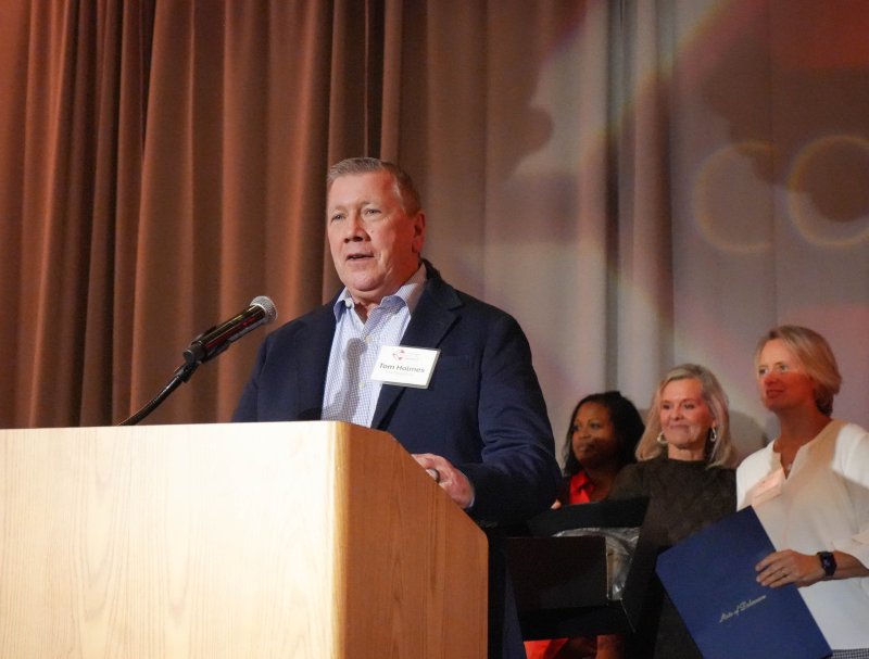 Tom Holmes, managing partner at 1776 Steakhouse, speaks at the gala after accepting the DRA’s prestigious Cornerstone Award.