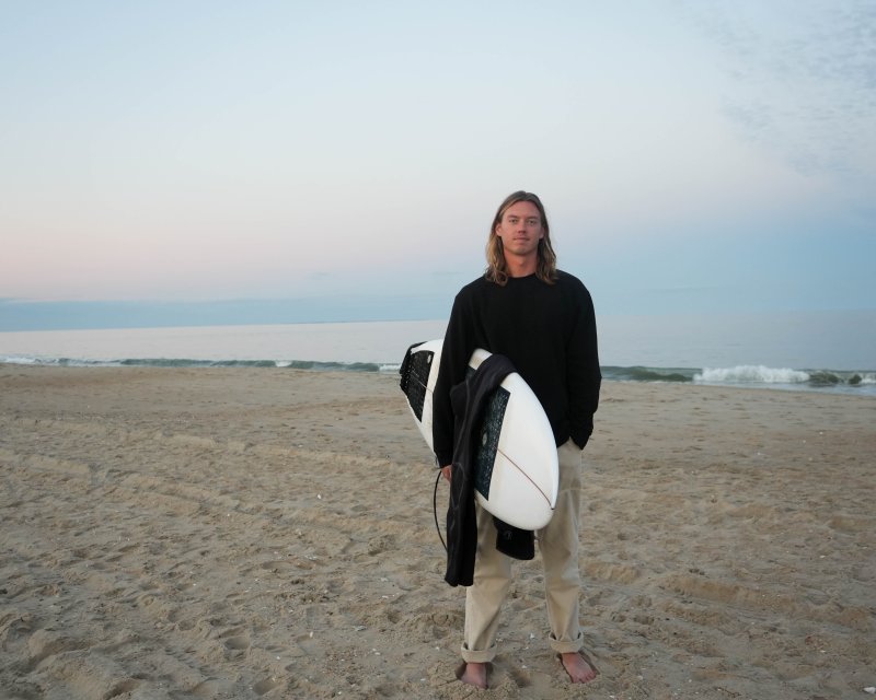 Grant Otto likes to surf whenever he can, year-round.