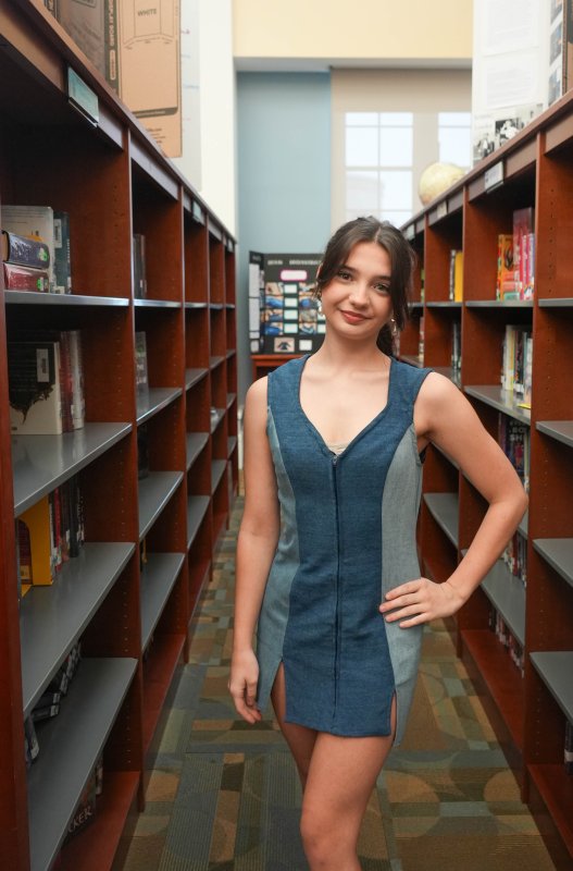 Fashion student Madeline Cordrey models her denim upcycled dress.