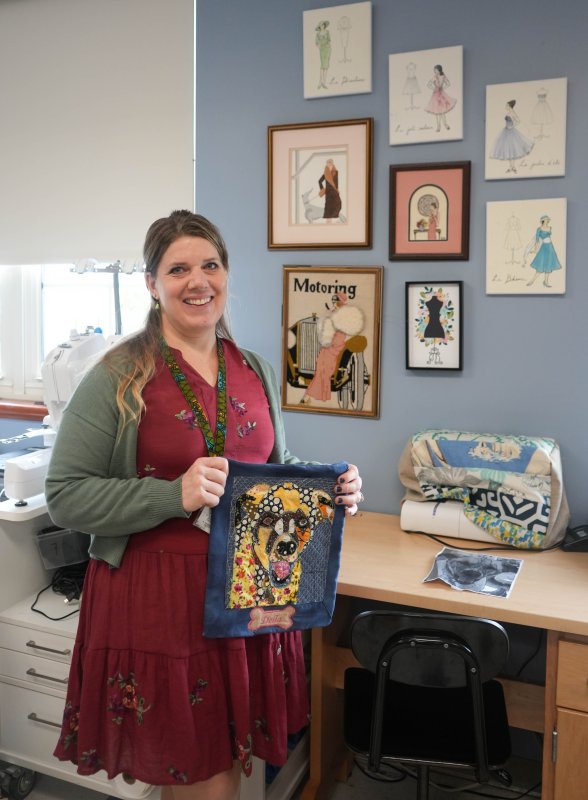 Alayna Aiken, Cape High fashion program teacher, displays her artwork in her classroom.