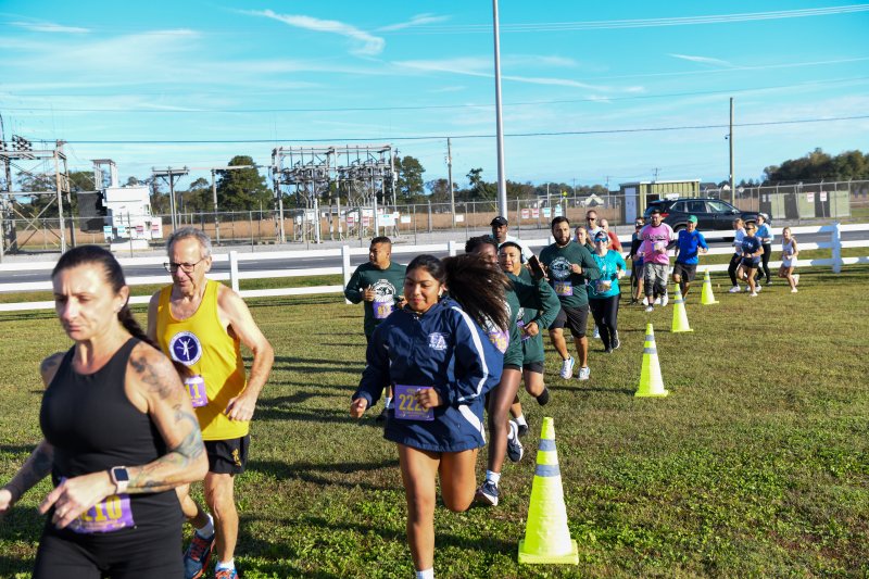 Runners head out to pasture at the start of the Lace Up for Ag Literacy 5K at Hopkins Farm near Milton. DAVE FREDERICK PHOTOS