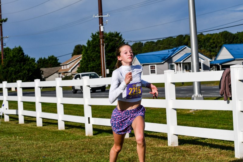 Josephine Rickenback, 11, wins the overall female title in 22:20.