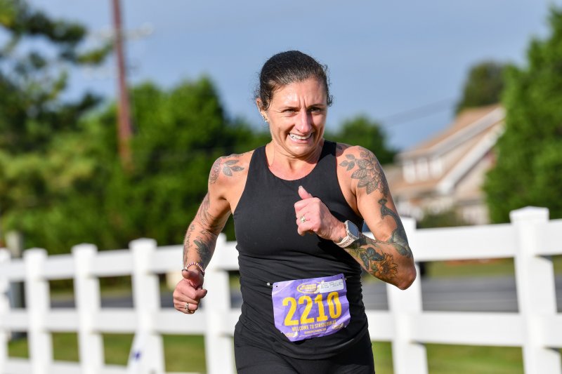 Tabitha Palkewicz wins the female masters title in 26:14.