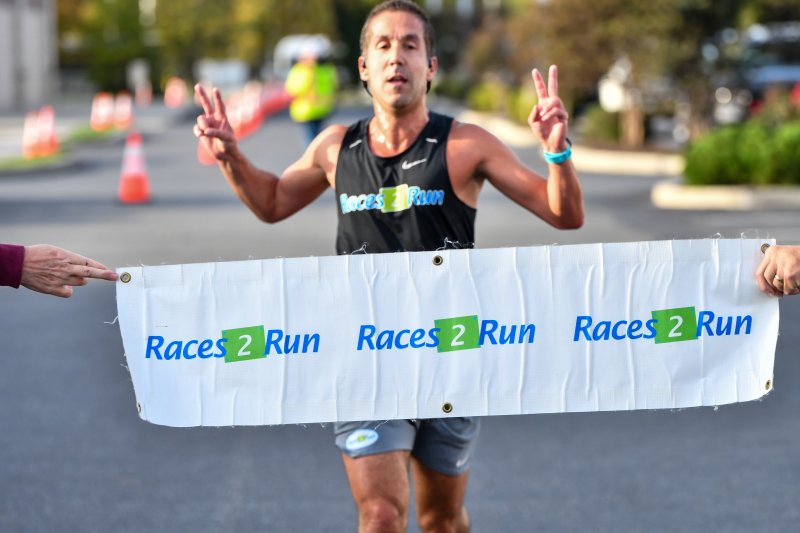 Matt Sparacino breaks the banner in 17:41.