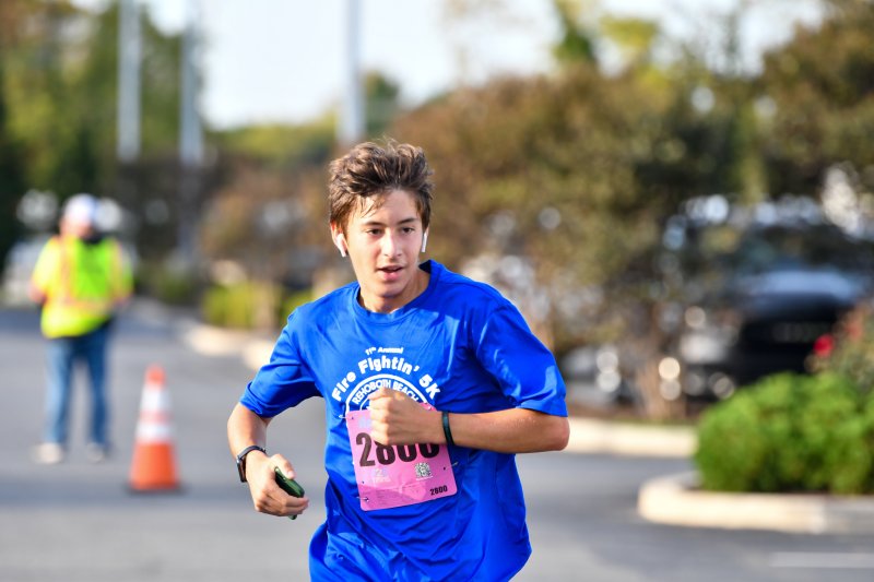 Parker Mathews takes third place in 19:51.