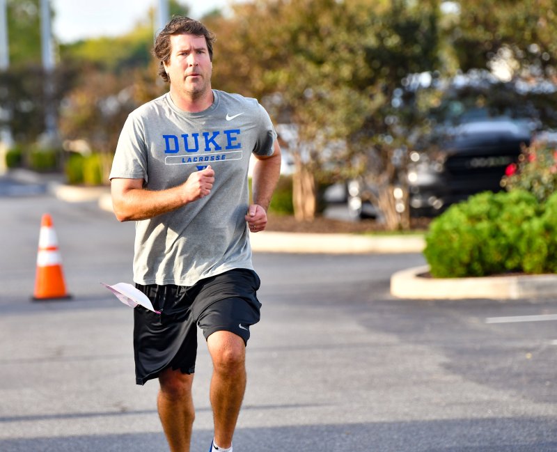 Josh Coveleski heads home with a time of 24:04.