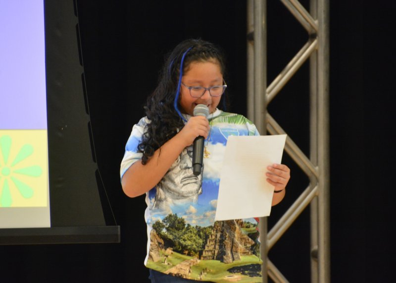 Ariadne Domingo-Santiago presents a reading of “Poem to My Country” by Oswald Cifuentes.