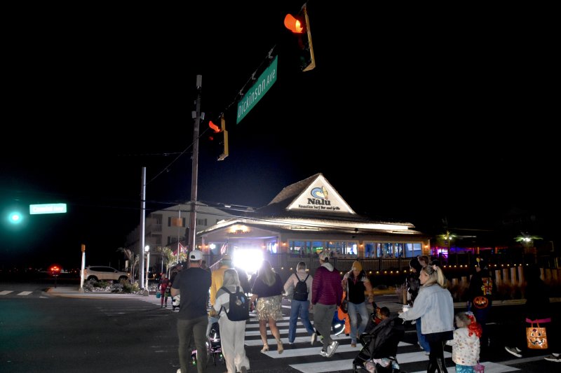 People from all over flood the town of Dewey Beach to visit local businesses.