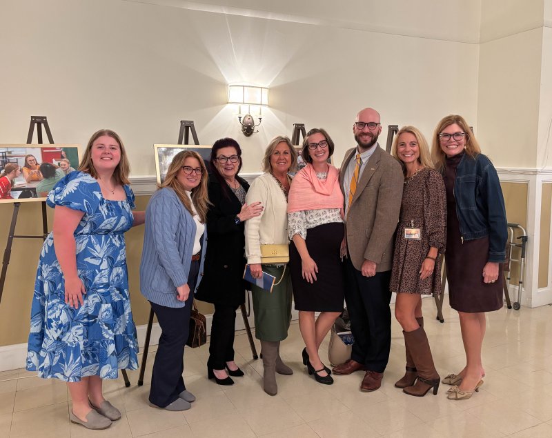 Colleagues and loved ones support the Cape District’s 2025-26 Teacher of the Year, Chris Burkhart, third from right, at the state 2025 Teacher of the Year ceremony in Dover Oct. 14. Shown are (l-r) colleague Elly Rolfes, board members Patty Maull and Janis Hanwell, Assistant Superintendent LouAnn Hudson, wife Jenna Burkhart, Chris Burkhart, Superintendent Jenny Nauman and Director of Teaching and Learning Amanda Archambault. ELLEN MCINTYRE PHOTO