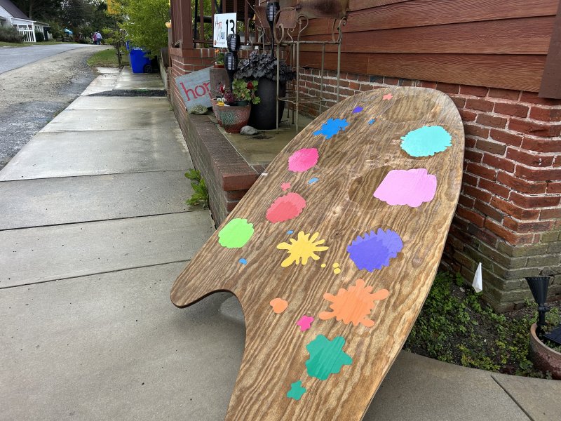 Residents of Georgetown’s Pallet Village contributed a large-scale palette board, which was on display at 302 Mill St.