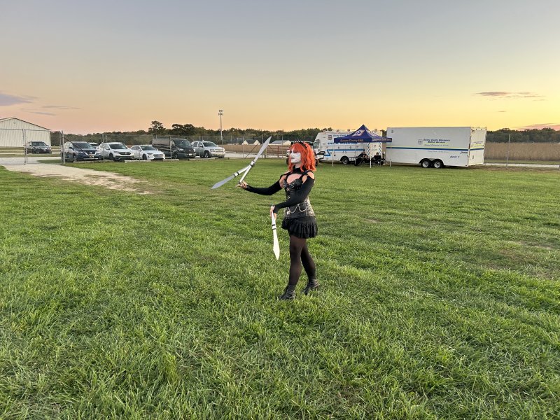 Performer Kat Alexander juggles knives at Milton Theatre’s Zombie Fest Oct. 18.