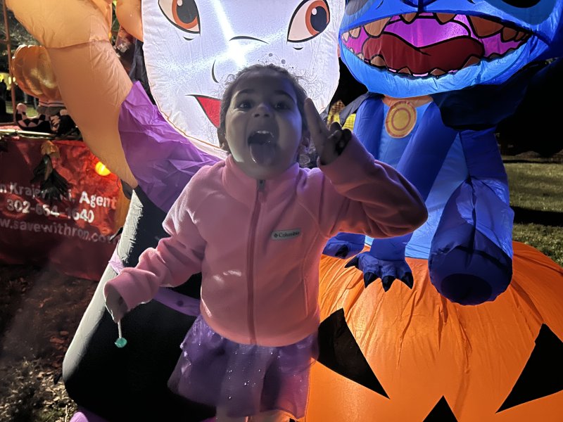 Taking part in the Wicked Weekend festivities is Divya Nainani, 3, hanging out with inflatable versions of Lilo and Stitch. RYAN MAVITY PHOTOS