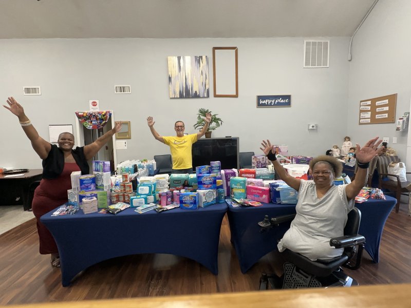 Gathered with items donated for Unique Minds Changing Lives and the community members it serves are (l-r) Kristy Gibbs, Jim Miller and Helena Gibbs. SUBMITTED PHOTO